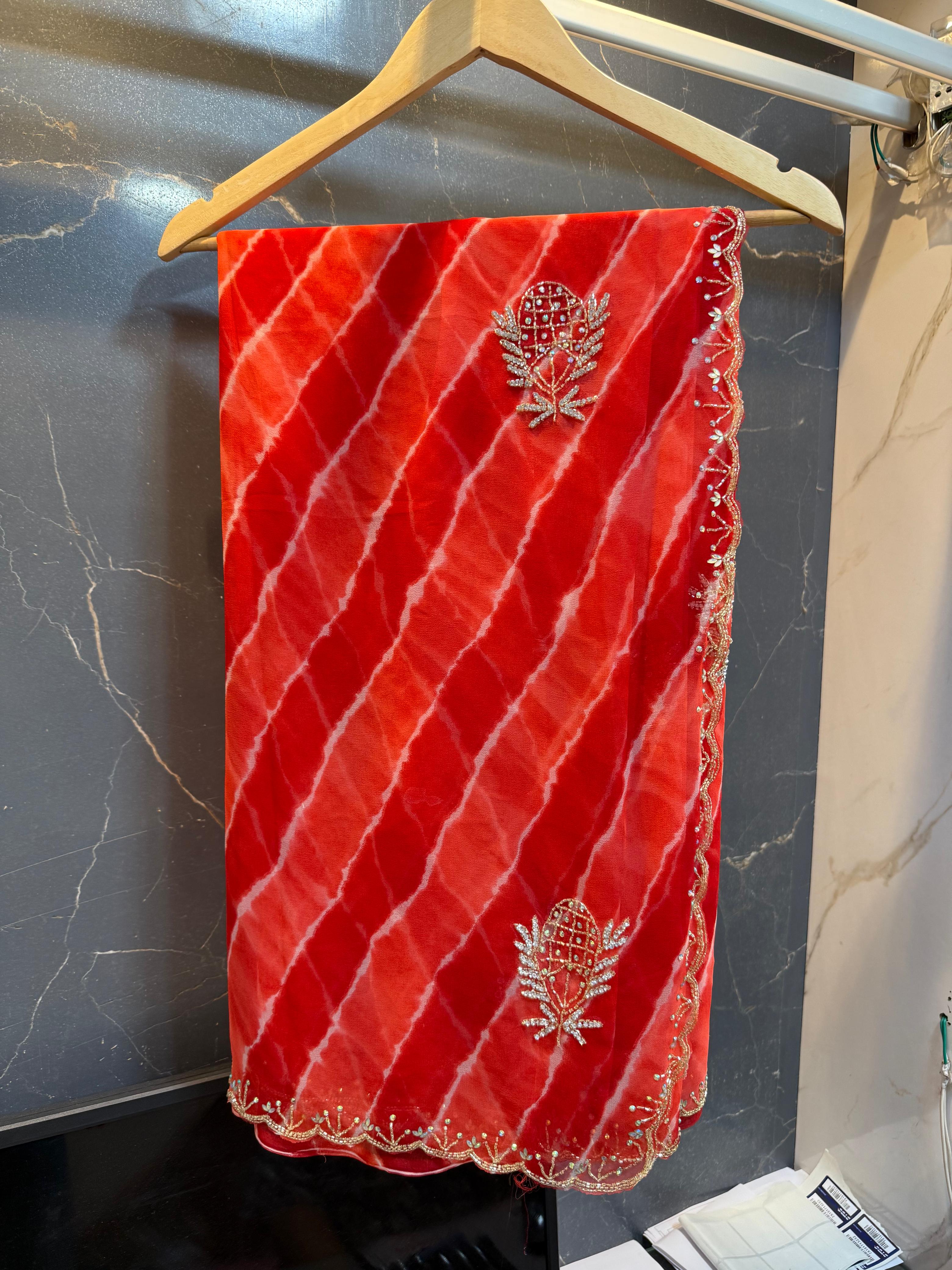 Latest Georgatte Weightless Lahriya Saree With Handwork