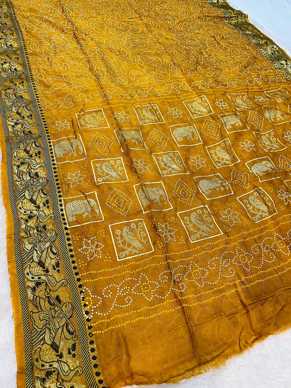 Brasso Febric Saree With Traditional Weaving Border